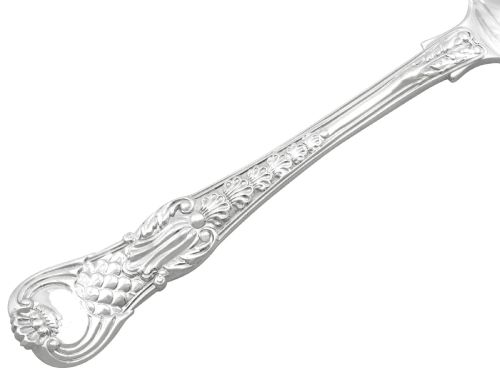 fig 8. A collection of ornate sterling silver cutlery pieces featuring intricately embossed handles and polished bowls, including ladles, forks, knives, and spoons.