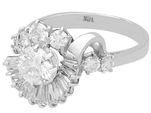 fig 6. An 18ct white gold Art Deco cocktail ring featuring a central round diamond surrounded by a fan of baguette diamonds and accent round diamonds.