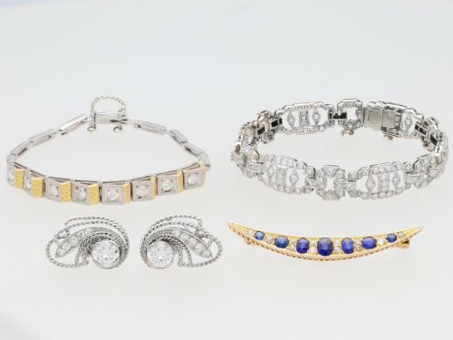 fig 4. An antique late Victorian 9ct yellow gold crescent brooch set with graduated oval blue sapphires and accent diamonds.