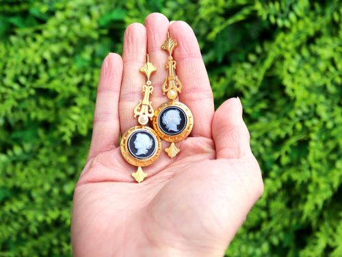 fig 1. A pair of late Victorian 22ct yellow gold drop earrings featuring hand-carved hardstone cameo profile portraits and small seed pearls.