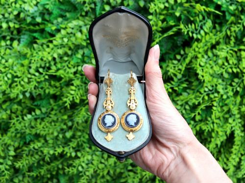 fig 2. A pair of late Victorian 22ct yellow gold drop earrings featuring hand-carved hardstone cameo profile portraits and small seed pearls.