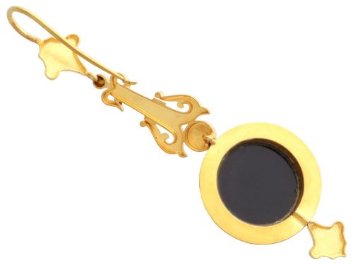 fig 7. A pair of late Victorian 22ct yellow gold drop earrings featuring hand-carved hardstone cameo profile portraits and small seed pearls.