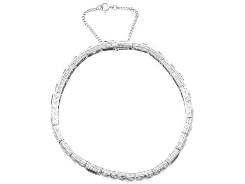 fig 5. An Art Deco platinum bracelet featuring square basaltic blue sapphires and diamond-shaped link panels set with old-cut diamonds.