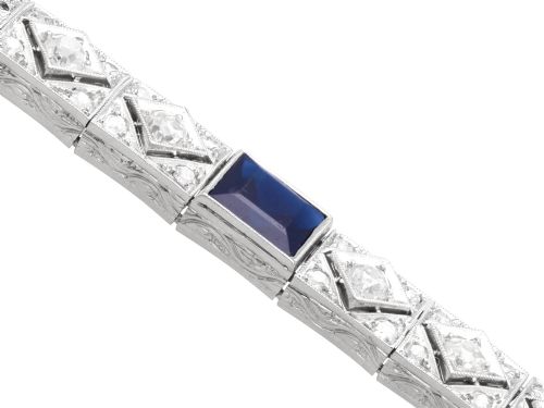 fig 6. An Art Deco platinum bracelet featuring square basaltic blue sapphires and diamond-shaped link panels set with old-cut diamonds.