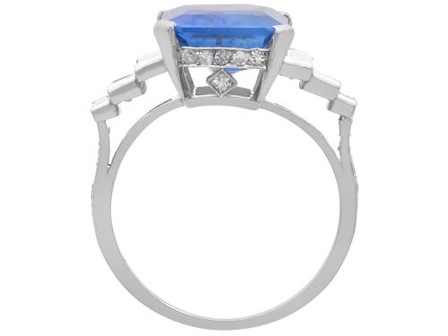 fig 5. An emerald-cut blue sapphire ring set in platinum with stepped baguette diamond shoulders.