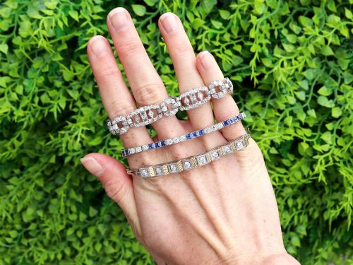 fig 2. An Art Deco platinum bracelet featuring articulated geometric links set with brilliant-cut diamonds.