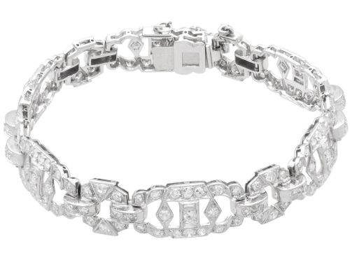 fig 5. An Art Deco platinum bracelet featuring articulated geometric links set with brilliant-cut diamonds.