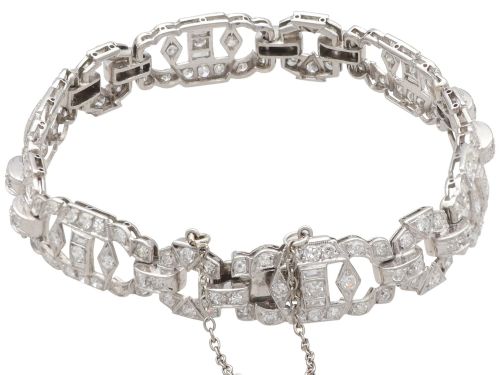 fig 6. An Art Deco platinum bracelet featuring articulated geometric links set with brilliant-cut diamonds.