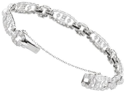 fig 7. An Art Deco platinum bracelet featuring articulated geometric links set with brilliant-cut diamonds.