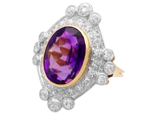 fig 5. An Art Deco ring featuring a central oval purple amethyst set in yellow gold, framed by a millegrain diamond halo.