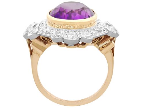 fig 7. An Art Deco ring featuring a central oval purple amethyst set in yellow gold, framed by a millegrain diamond halo.