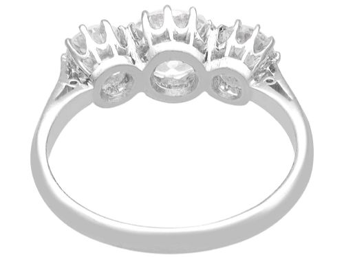 fig 6. An Art Deco platinum ring set with three claw-set round diamonds positioned horizontally along the band.