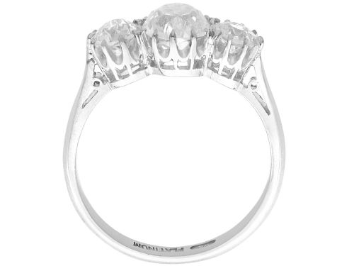 fig 7. An Art Deco platinum ring set with three claw-set round diamonds positioned horizontally along the band.