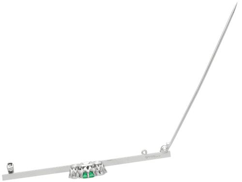 fig 8. An antique 18ct white gold bar brooch featuring a central rectangular emerald cut emerald flanked by two round diamonds on a slender horizontal metal bar.