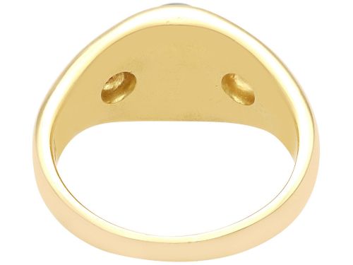 fig 5. An 18ct yellow gold ring set with a central oval cabochon tigers eye stone flanked by two flush-set diamonds.