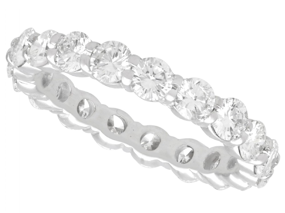 A vintage 18ct white gold full eternity ring set with round brilliant-cut diamonds around the entire band.