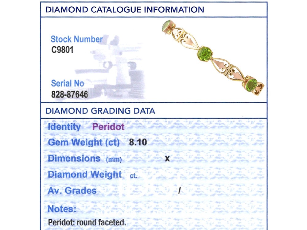 An antique Art Nouveau 9ct yellow gold bracelet featuring round-cut green peridots held in collet settings between openwork scroll links. View XII