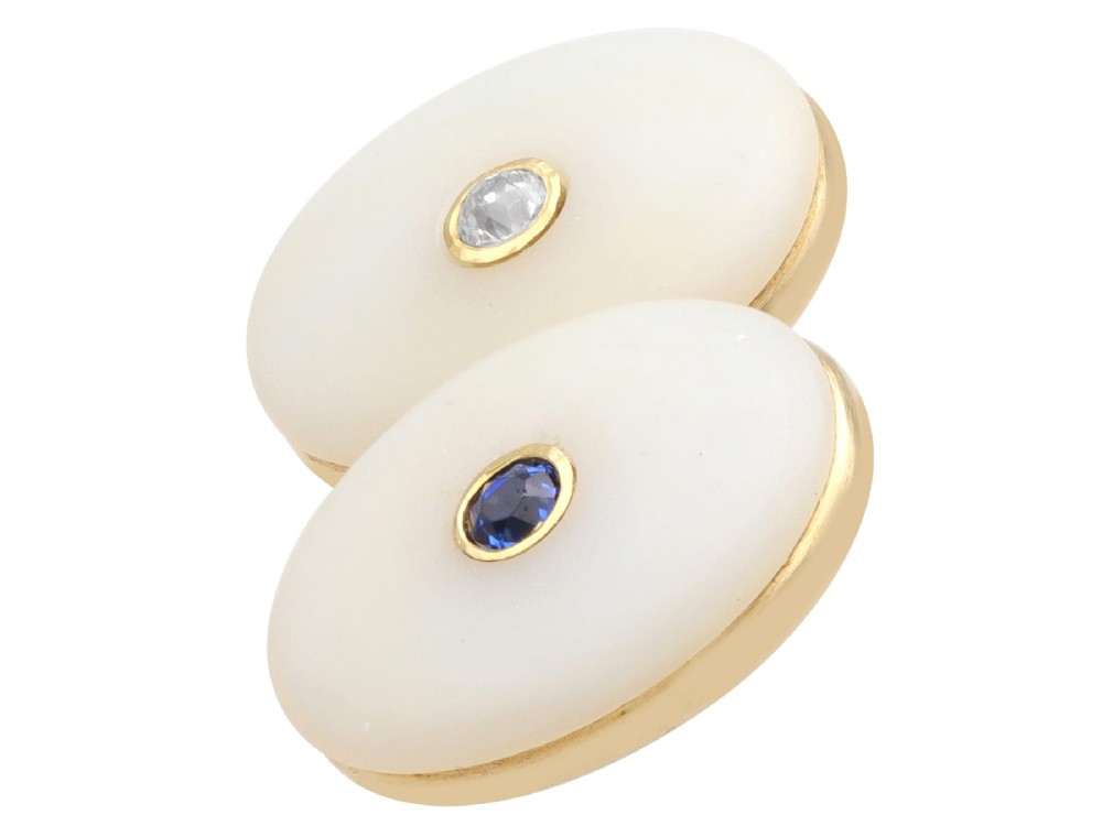 Four oval 15ct yellow gold cufflinks featuring smooth white agate faces with central bezel-set diamond, sapphire, and ruby gemstones. View IX