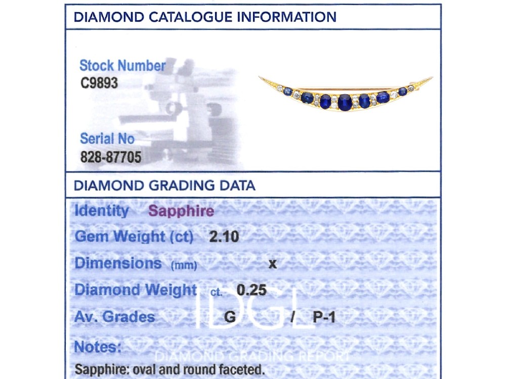 An antique late Victorian 9ct yellow gold crescent brooch set with graduated oval blue sapphires and accent diamonds. View X