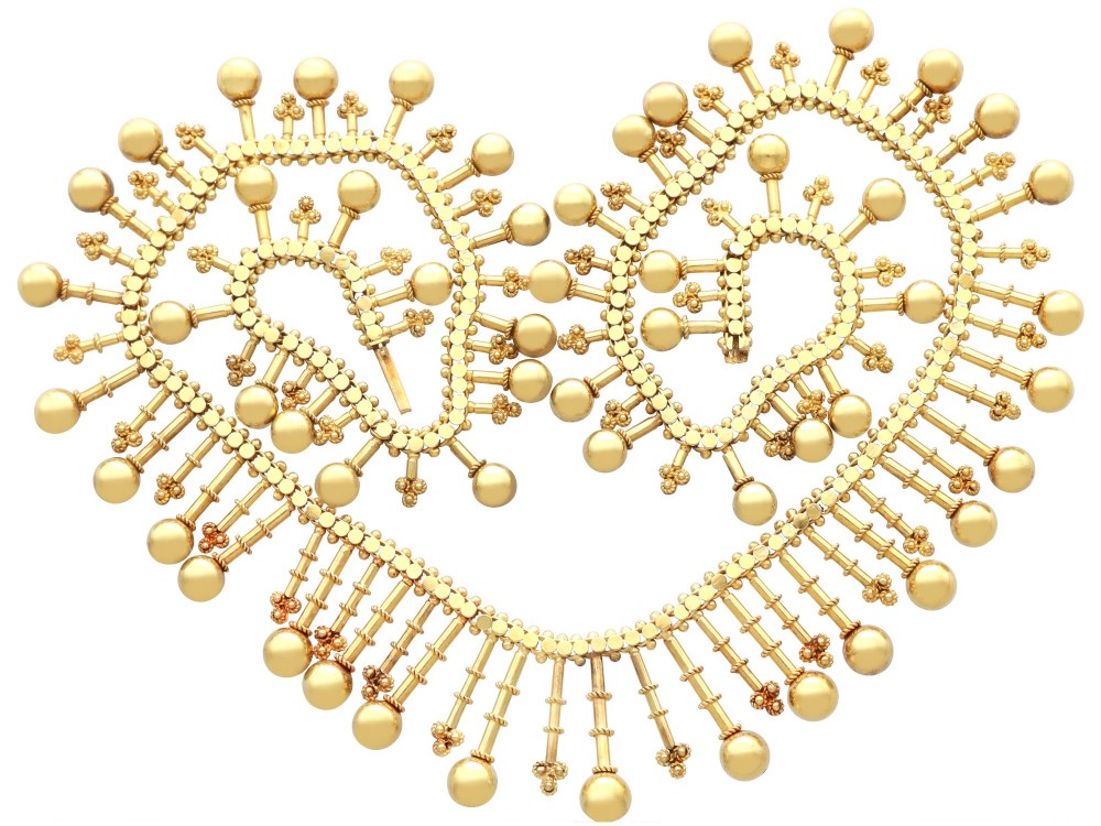 An antique 18ct yellow gold Victorian fringe necklace featuring articulated drop elements with spherical ball terminals and beaded details. View VII
