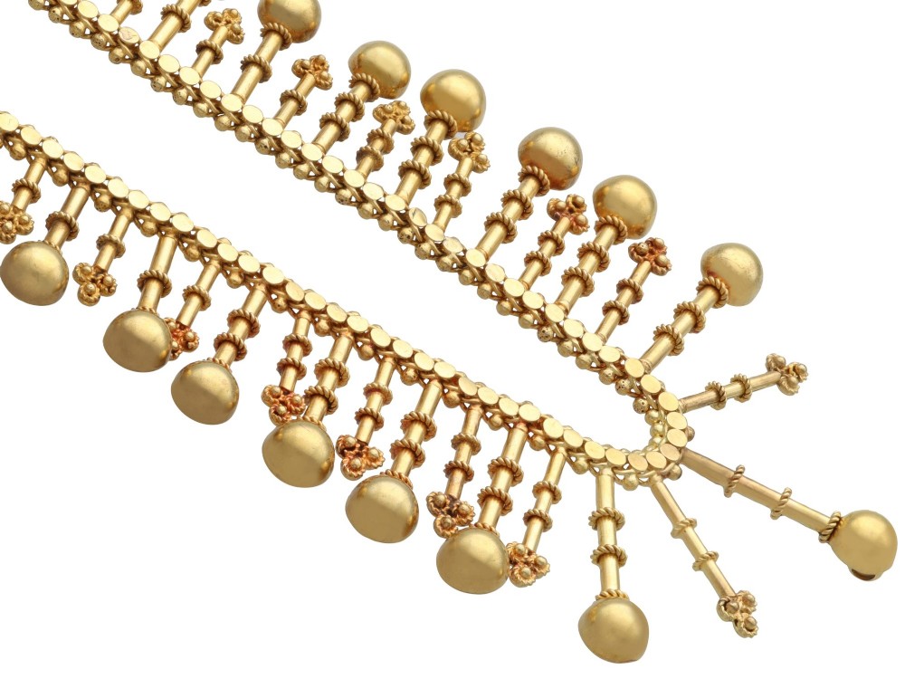 An antique 18ct yellow gold Victorian fringe necklace featuring articulated drop elements with spherical ball terminals and beaded details. View IX
