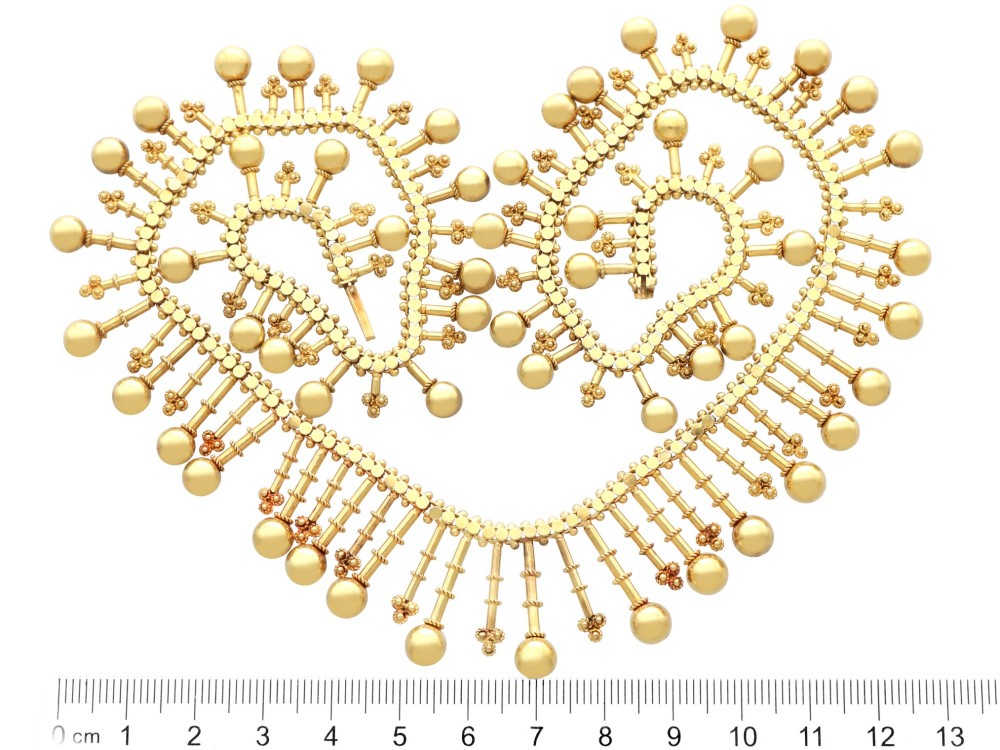 An antique 18ct yellow gold Victorian fringe necklace featuring articulated drop elements with spherical ball terminals and beaded details. View XI