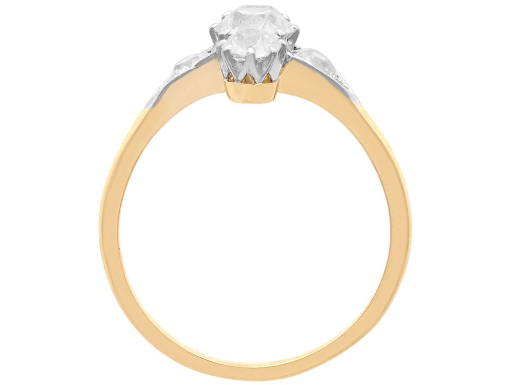 An antique 18ct yellow gold ring featuring five old-cut diamonds set in a geometric white metal arrangement. View IX