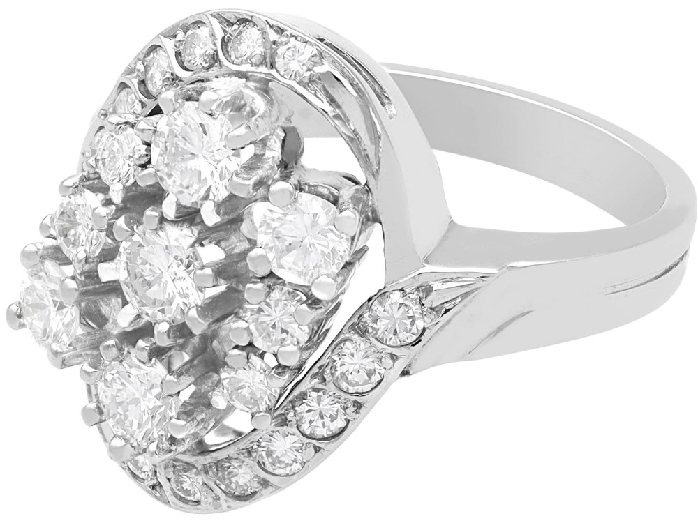 A vintage 1950s 14ct white gold dress ring featuring a multi-diamond cluster and curved accent bands. View VI