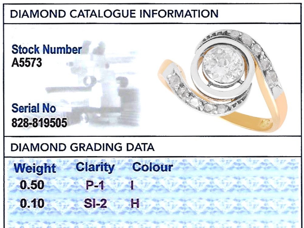 An antique 18ct yellow gold twist ring featuring a central round diamond set within a swooping platinum accent band set with smaller diamonds. View XI