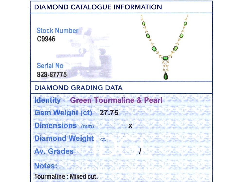 A late Victorian 14ct yellow gold necklace featuring emerald-cut green tourmalines connected by seed pearl foliate links and terminating in a pear-cut green tourmaline drop pendant. View XIII