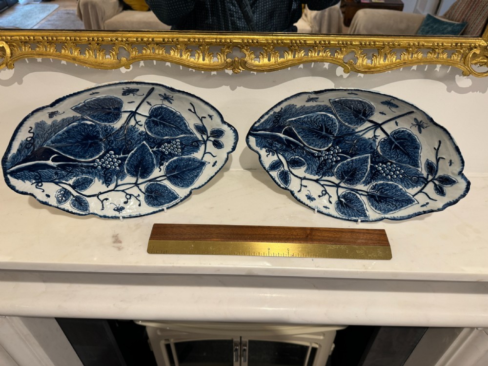 A pair of oval 18th-century English Bow porcelain serving dishes decorated with underglaze blue vine leaves, grapes, and insects. View II