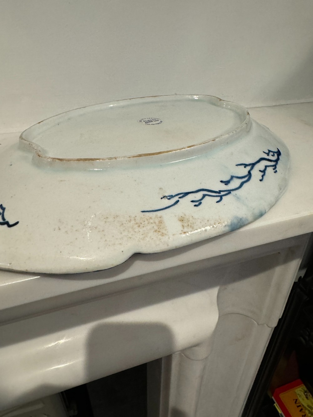 A pair of oval 18th-century English Bow porcelain serving dishes decorated with underglaze blue vine leaves, grapes, and insects. View VIII