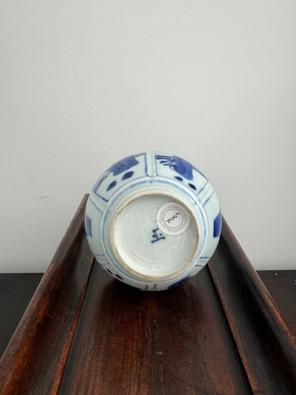 A Chinese Kangxi period underglaze blue and white porcelain vase decorated with figural panels and topped with an engraved silver Islamic mount. View VI