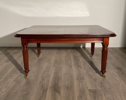 LARGE ANTIQUE 19TH CENTURY EXTENDING DINING TABLE IN MAHOGANY - ADDITIONAL PHOTO 1