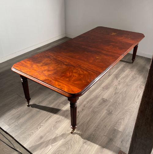 LARGE ANTIQUE 19TH CENTURY EXTENDING DINING TABLE IN MAHOGANY - ADDITIONAL PHOTO 3