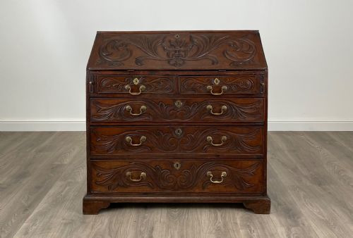 antique 18th century heavily carved bureau in oak - CATEGORY: ANTIQUE BUREAU - DATED 18TH CENTURY