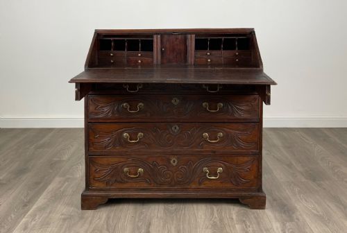ANTIQUE 18TH CENTURY HEAVILY CARVED BUREAU IN OAK - ADDITIONAL PHOTO 1