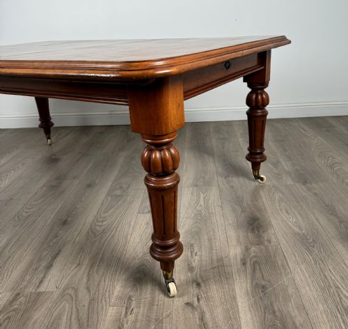 ANTIQUE 19TH CENTURY EXTENDING DINING TABLE IN MAHOGANY - ADDITIONAL PHOTO 5