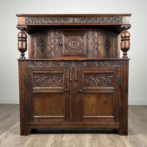 antique 19th century heavily carved court cupboard in oak - CATEGORY: ANTIQUE CUPBOARDS - DATED VICTORIAN