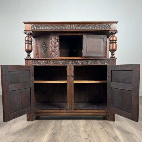 ANTIQUE 19TH CENTURY HEAVILY CARVED COURT CUPBOARD IN OAK - ADDITIONAL PHOTO 1