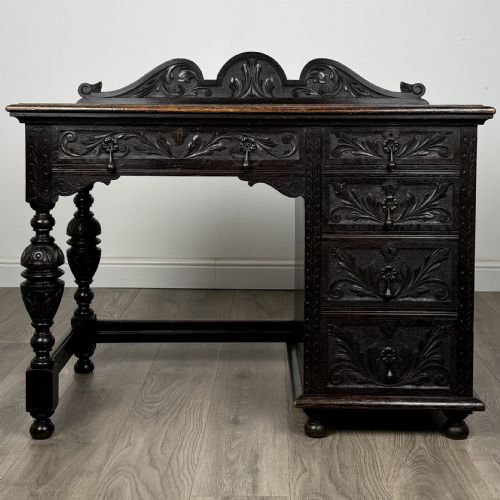 antique 19th century heavily carved oak single pedestal desk - CATEGORY: ANTIQUE DESKS - DATED VICTORIAN