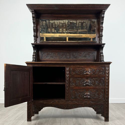 ANTIQUE 19TH CENTURY HEAVILY CARVED SIDEBOARD IN OAK - ADDITIONAL PHOTO 1
