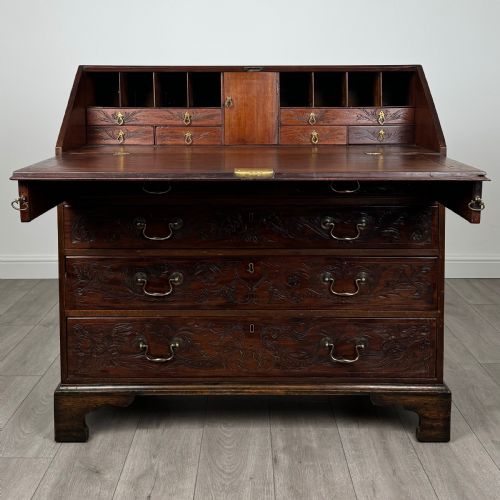 ANTIQUE 18TH CENTURY HEAVILY CARVED BUREAU IN OAK - ADDITIONAL PHOTO 1