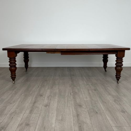 ANTIQUE 19TH CENTURY EXTENDING DINING TABLE IN OAK - ADDITIONAL PHOTO 1