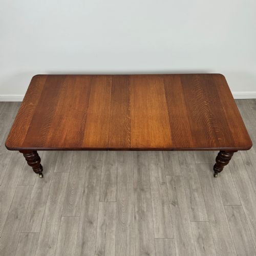 ANTIQUE 19TH CENTURY EXTENDING DINING TABLE IN OAK - ADDITIONAL PHOTO 2