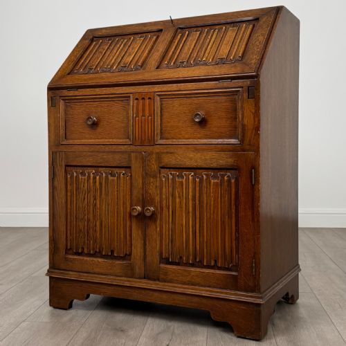 ANTIQUE 20TH CENTURY LINENFOLD BUREAU IN OAK - ADDITIONAL PHOTO 2