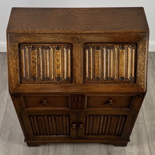 ANTIQUE 20TH CENTURY LINENFOLD BUREAU IN OAK - ADDITIONAL PHOTO 9