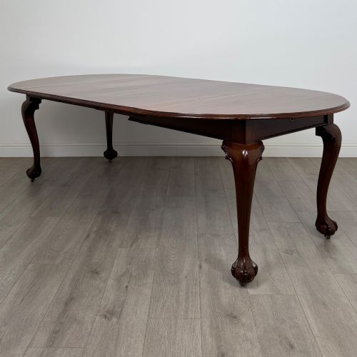 ANTIQUE 20TH CENTURY EXTENDING DINING TABLE IN MAHOGANY