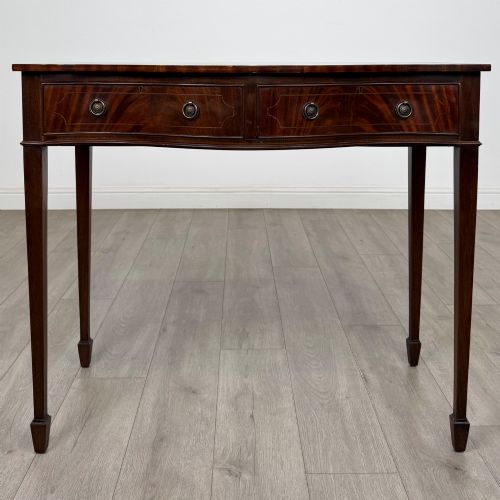 antique 20th century serpentine writing table in mahogany - CATEGORY: ANTIQUE TABLES - DATED EDWARDIAN