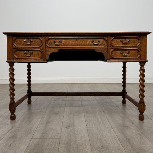 antique 20th century jacobean style writing table in golden oak - CATEGORY: ANTIQUE DESKS - DATED EDWARDIAN
